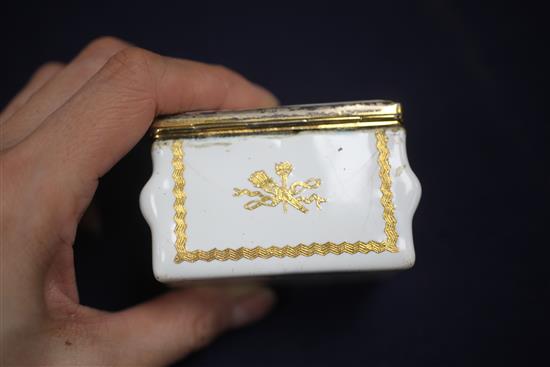 A late 18th / early 19th century French gilt metal mounted commode shaped white enamel snuff box, 3in.